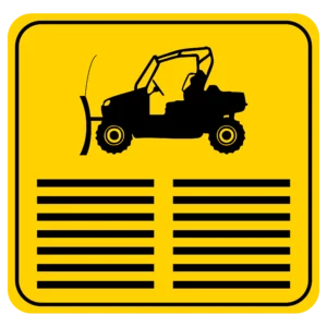 A yellow square sign depicting a black silhouette of a UTV with a snowplow attached. The lower half of the sign contains horizontal black bars simulating lines of text.